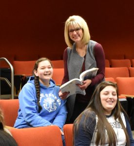Jodi Calvert works closely with Anna Wagner and Sarah Kalbach in a First-Year Experience class.